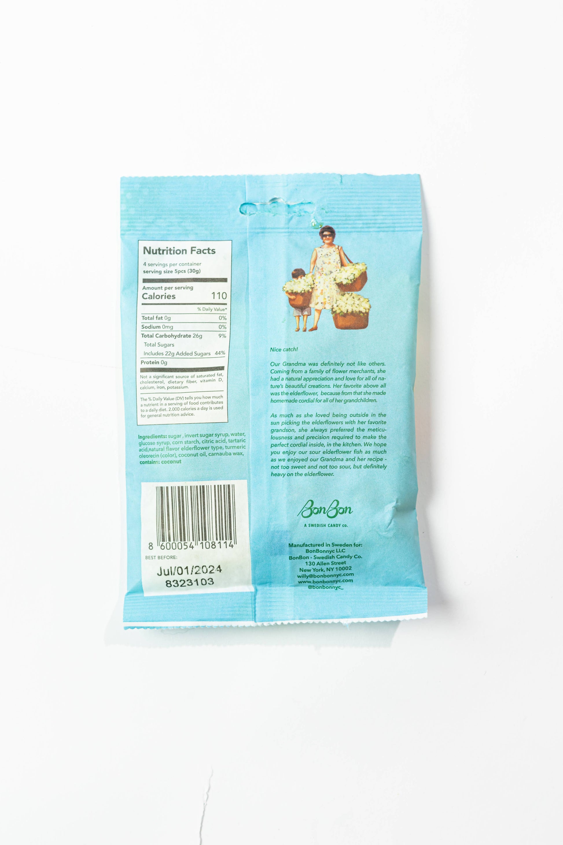 Back of a blue package with nutritional information and branding on a white background