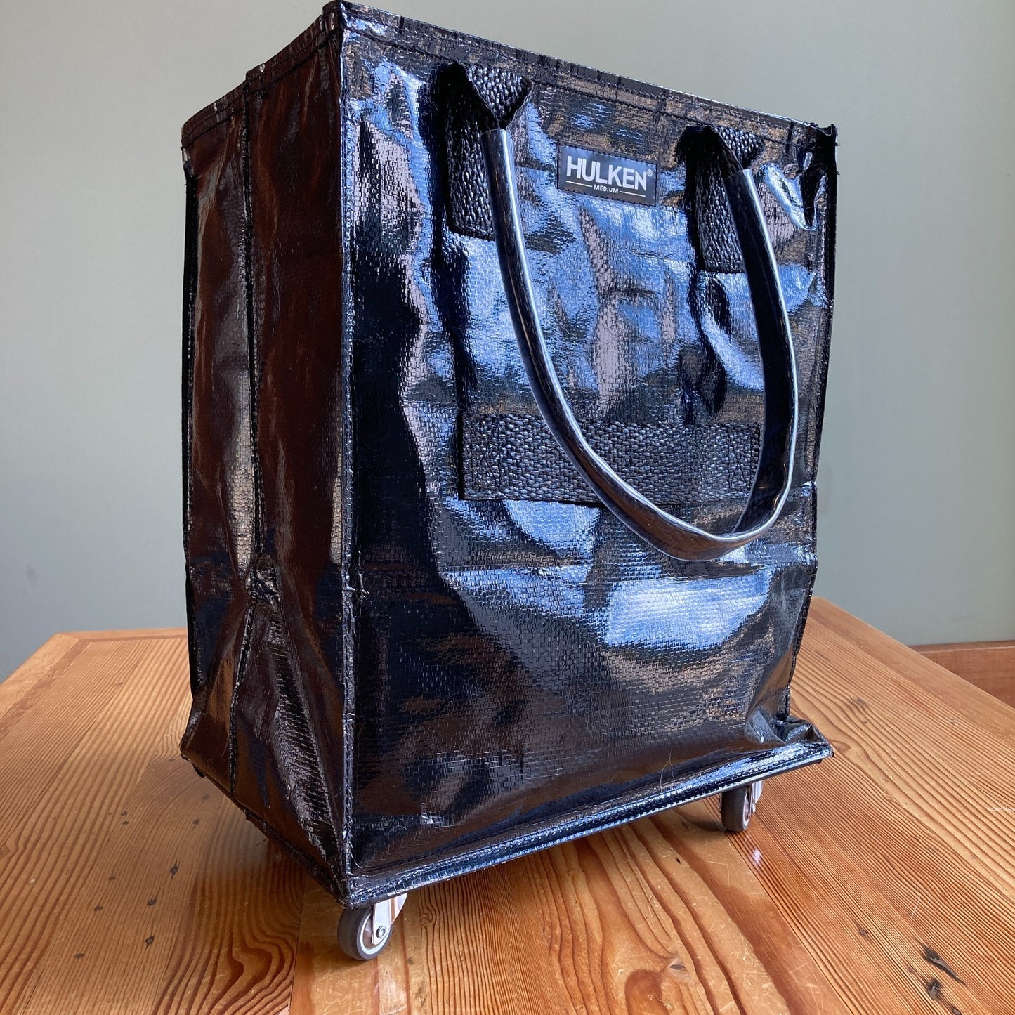 Hulken $125 Black Medium 16x12x20" Swivel Wheel Rolling Bag Tote - 0105MR