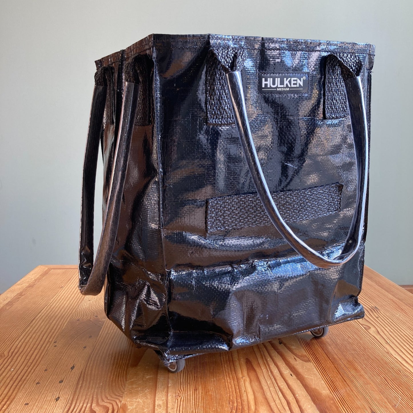 Hulken $125 Black Medium 16x12x20" Swivel Wheel Rolling Bag Tote - 0105MR