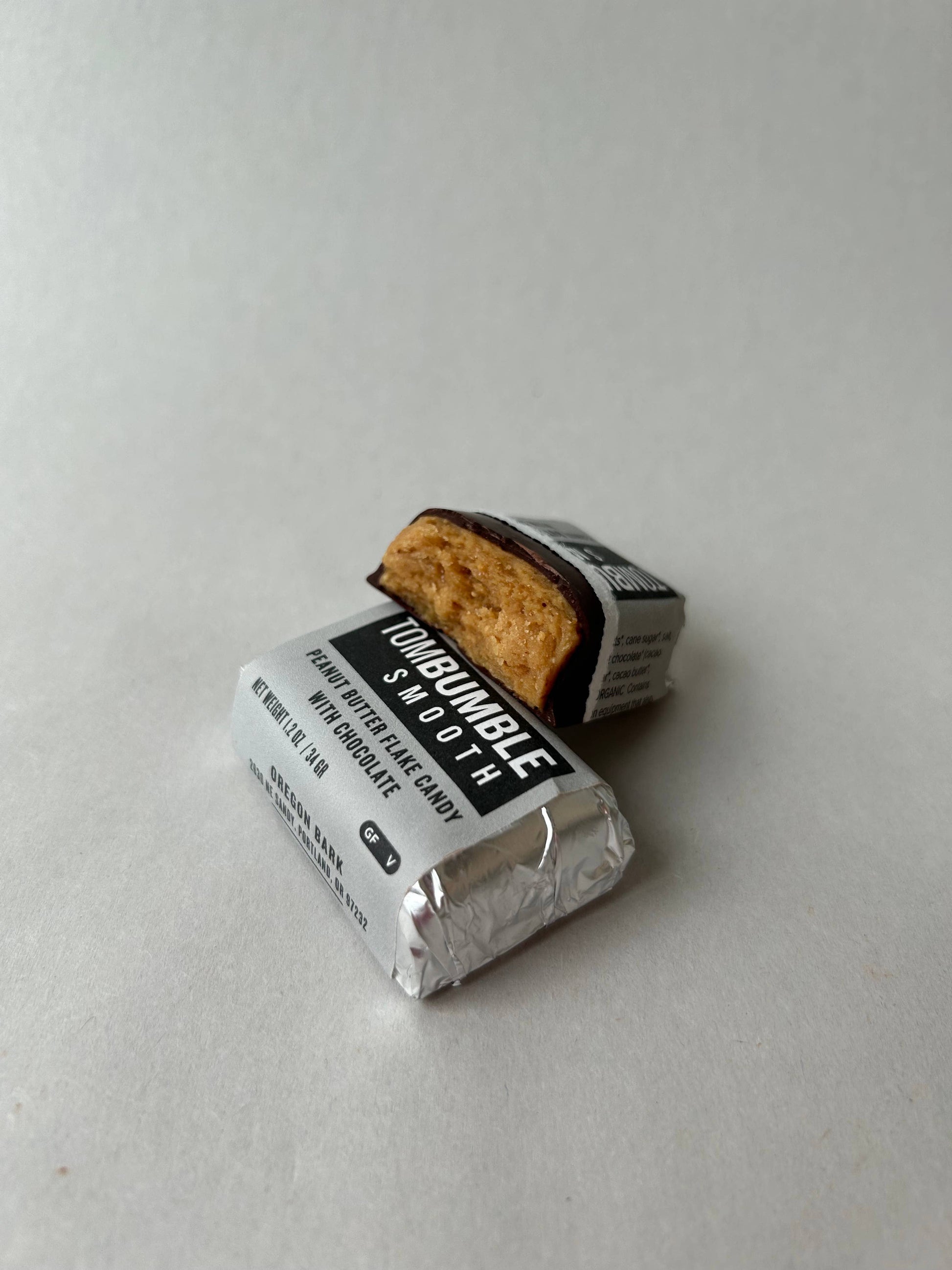 Unwrapped Tom Bumble Nutty and Smooth candy bars with chocolate coating